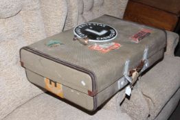 Vintage suitcase, cast metal White Star sign and P & O egg cup.