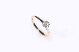 Solitaire diamond ring set in 18 carat gold and platinum, size O.