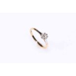 Solitaire diamond ring set in 18 carat gold and platinum, size O.
