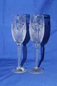 Pair of Waterford Crystal seahorse flute glasses, no. 129157, with box.