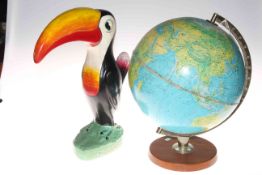 Terrestial globe and a Toucan ornament 41cm.