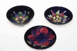 Three small Moorcroft dishes including columbine with warrant label.
