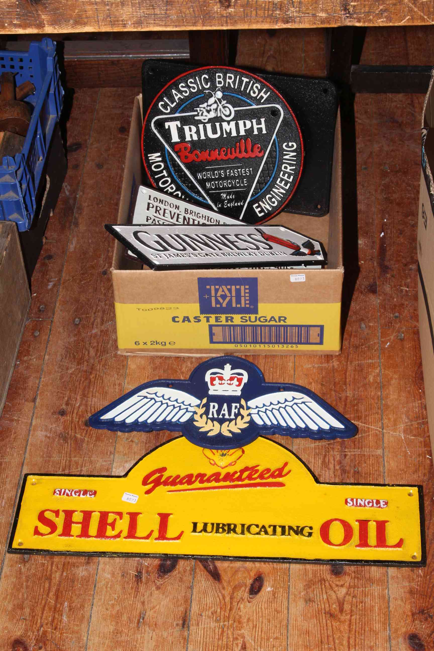 Six cast iron signs including motoring, breweriana and railway interest.