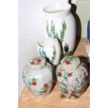Pair of Oriental lidded vases and two Radford vases.