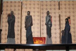 Four boxed Maasai Soul Journeys Sculptures by Stacy Bayne.