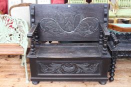 Carved oak monks bench.