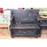 Carved oak monks bench.