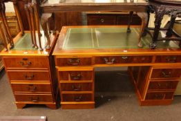 Yew eight drawer pedestal desk 137cm by 76cm and matching two drawer filing cabinet, 49cm by 77cm.