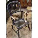 Antique Windsor elm spoke back elbow chair.