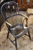 Antique Windsor elm spoke back elbow chair.