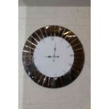 Large contemporary mirror panelled wall clock, 90cm diameter.