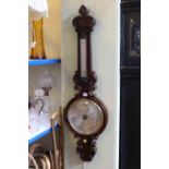 Antique rosewood banjo barometer having silvered dial, signed L. Casella, London.