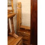 Artists adjustable easel, rule and three drawer pedestal chest (3).