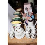 Four Royal Doulton character jugs, three Wade Nat West piggy banks,