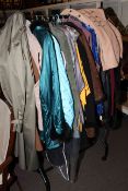 Collection of vintage coats and clothing.
