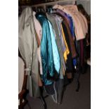 Collection of vintage coats and clothing.