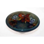 Moorcroft bowl with foliate decoration on blue/green shaded ground, painted signature,