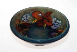 Moorcroft bowl with foliate decoration on blue/green shaded ground, painted signature,