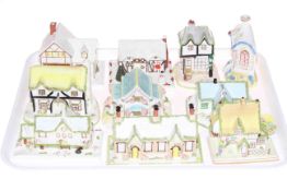 Collection of ten Coalport cottages.