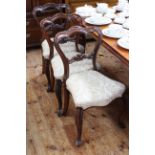 Set of six Victorian rosewood shaped balloon back parlour chairs.