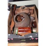 Box of African sculptures, snake skin, miniature chest of drawers, etc.