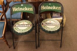 Pair novelty Heineken folding cafe chairs.