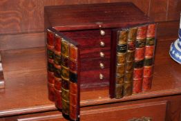 Five drawer specimen chest in a form of a book shelf, 30cm by 24cm.