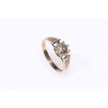 9 carat gold and diamond set flower ring, size R.