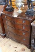 Mahogany serpentine front chest of four long drawers on bracket feet, 90.5cm by 90cm.