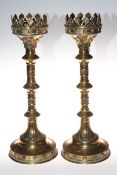 Pair of decorative brass altar candlesticks, 49.5cm high.