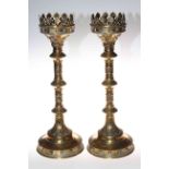 Pair of decorative brass altar candlesticks, 49.5cm high.