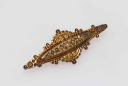 Late Victorian 9 carat gold die-stamped brooch set with seed pearls.