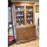 Edwardian inlaid mahogany bow front cabinet bookcase having two astragal glazed doors above two