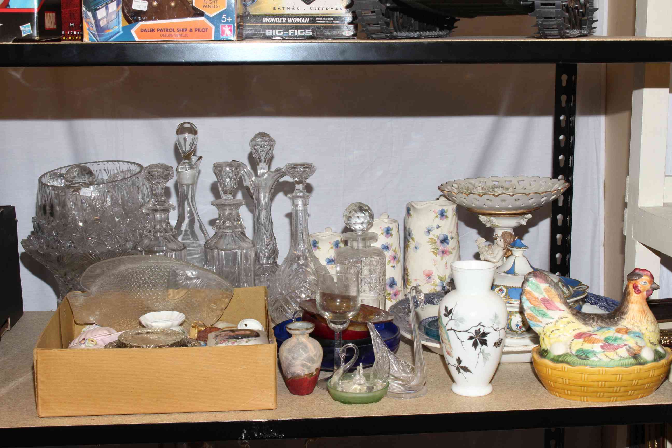 19th Century and later glass decanters, glass bowls, blue and white meat plate, cherub centre piece,