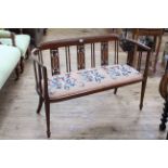 Edwardian mahogany and satinwood inlaid occasional settee, 111cm long.