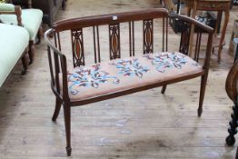 Edwardian mahogany and satinwood inlaid occasional settee, 111cm long.