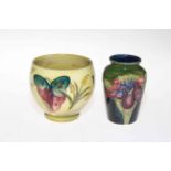 Moorcroft vase with arum lily on yellow ground, 8.5cm, together with small Moorcroft vase, 9cm (2).
