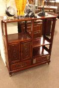 Oriental hardwood two drawer shelf unit 99cm by 112cm and an Oriental four door sideboard,