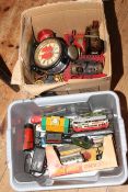 Two boxes of toy trains and railway collectables.