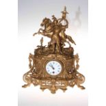 Continental gilt metal mantel clock mounted with warrior and horse with enamel dial.