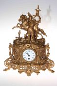 Continental gilt metal mantel clock mounted with warrior and horse with enamel dial.