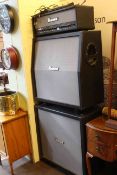 Ibanez Tone Blaster guitar amp and two large speakers.