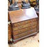 Georgian mahogany four drawer bureau on bracket feet, 92cm by 104cm.