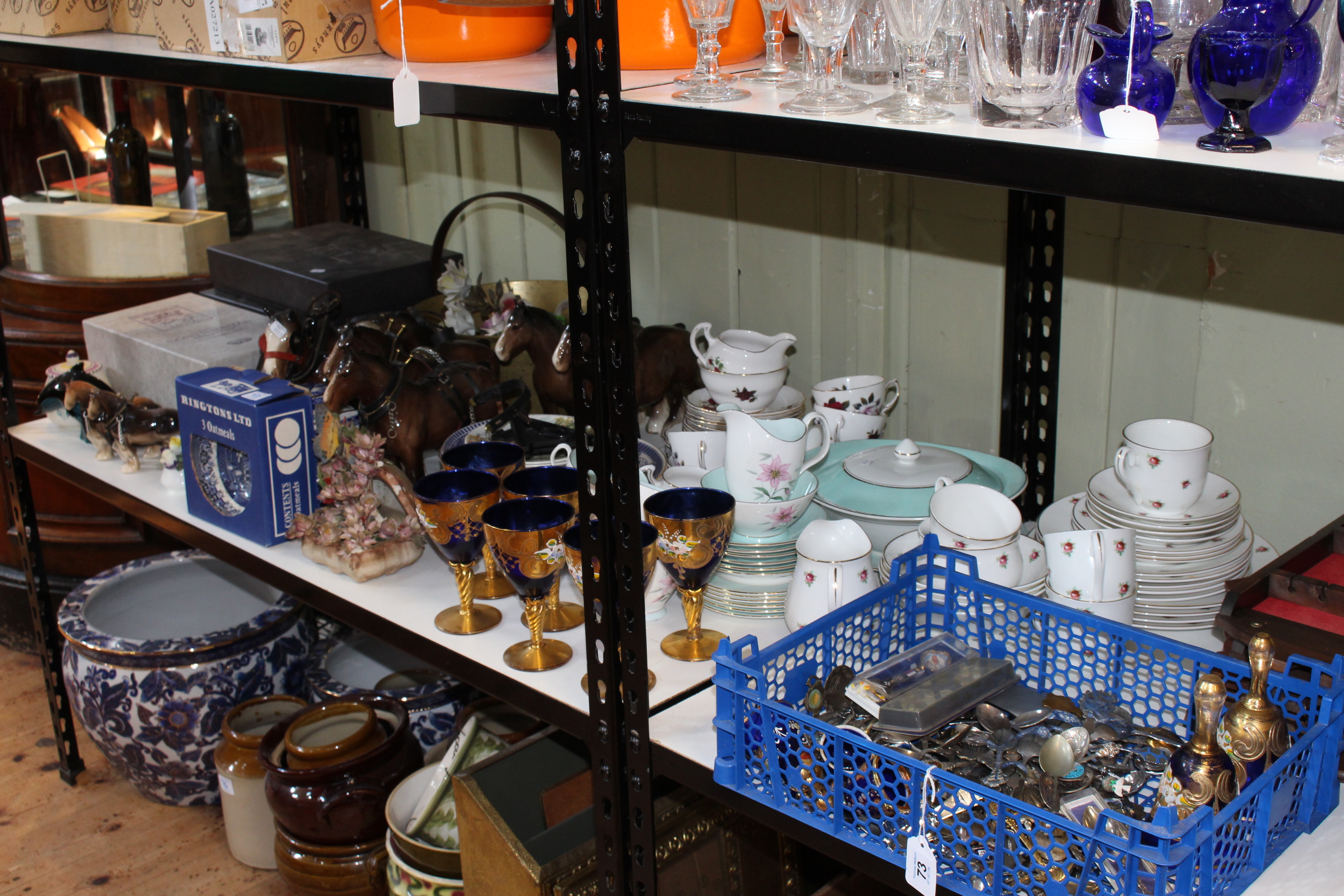 Collection of Edinburgh crystal, brass jam pan, Czech blue glass, souvenir spoons with stands,