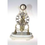 19th Century skeleton mantel clock with silvered Roman numeral dial on marble base.