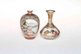 Two small Japanese vases with painted panels on patterned ground, both signed, 9cm.
