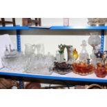 Collection of glassware including Carnival glass, decanters, jugs, vases, lamps, bowls, etc.