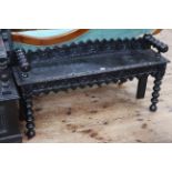 Victorian carved oak window seat on bobbin legs, 120cm long.