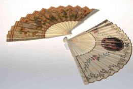Two antique ivory fans, both painted with panels and foliage.