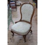 Victorian mahogany spoon back nursing chair.